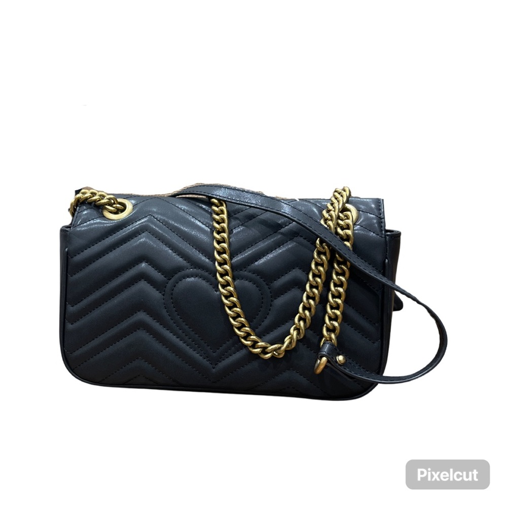 Small black leather shoulder bag with chainlink straps